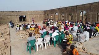 Christians Worship Inside a Burnt Church in Nigeria